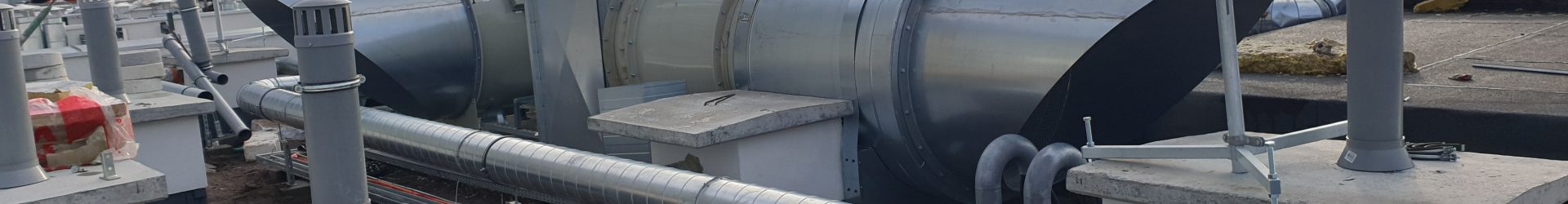Realizacja dostawy i montażu wentylacji oddymiania i wentylacji bytowej garażu w budynku mieszkalnym w Warszawie. Próby zadymienia garażu.
